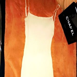 It’s this cool soft light cream night out dress